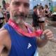 Christian from The Body Project finishing the City2Surf in 1:16:21 despite rainy conditions