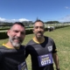 Christian Paesano and friend Roy at Randwick Racecourse after completing the Step Out for Cancer Run, celebrating the finish and supporting cancer awareness.